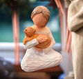 Wooden woman with cat